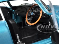 1964 Aston Martin DB5 RHD (Right Hand Drive) Light Blue Metallic 1/18 Diecast Model Car by Solido