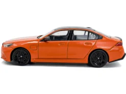 2024 BMW M5 Sedan Fire Orange III with Black Top 1/43 Diecast Model Car by Solido