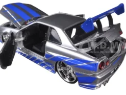 Brian's Nissan GTR Skyline R34 RHD (Right Hand Drive) Silver with Blue Stripes