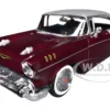 1957 Chevrolet Bel Air Burgundy Metallic and Silver Metallic "Timeless Legends" Series 1/24 Diecast Model Car by Motormax