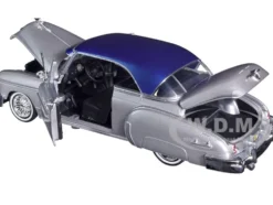 1950 Chevrolet Bel Air Lowrider Silver Metallic Blue Metallic Top Get Low Series 1/24 Diecast Model Car Motormax 79026