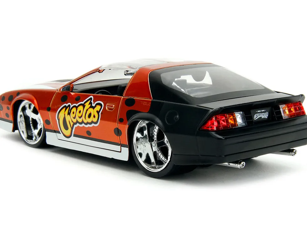 1985 Chevrolet Camaro Z 28 Orange Metallic with Graphics and Chester Cheetah Diecast Figure Cheetos Hollywood Rides Series 1/24 Diecast Model Car Jada 34384