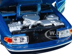 1993 Chevrolet Caprice Lowrider Blue Metallic Graphics Get Low Series 1/24 Diecast Model Car Motormax 79022