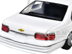 1993 Chevrolet Caprice Police Car Unmarked White "Custom Builder's Kit" Series 1/24 Diecast Model Car by Motormax