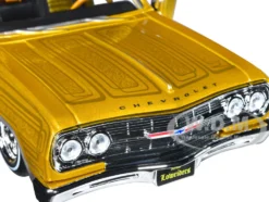 1965 Chevrolet El Camino Lowrider Gold Metallic Graphics Lowriders Series 1/25 Diecast Model Car Maisto 32543GLD