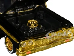 1964 Chevrolet Impala Lowrider Black with Gold Graphics and Wheels 