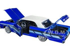 1964 Chevrolet Impala Lowrider Hard Top Candy Blue Metallic Cream Top Get Low Series 1/24 Diecast Model Car Motormax 79021