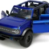 2021 Ford Bronco Open-Top Candy Blue Metallic with Extra Wheels "Just Trucks" Series 1/24 Diecast Model Car by Jada