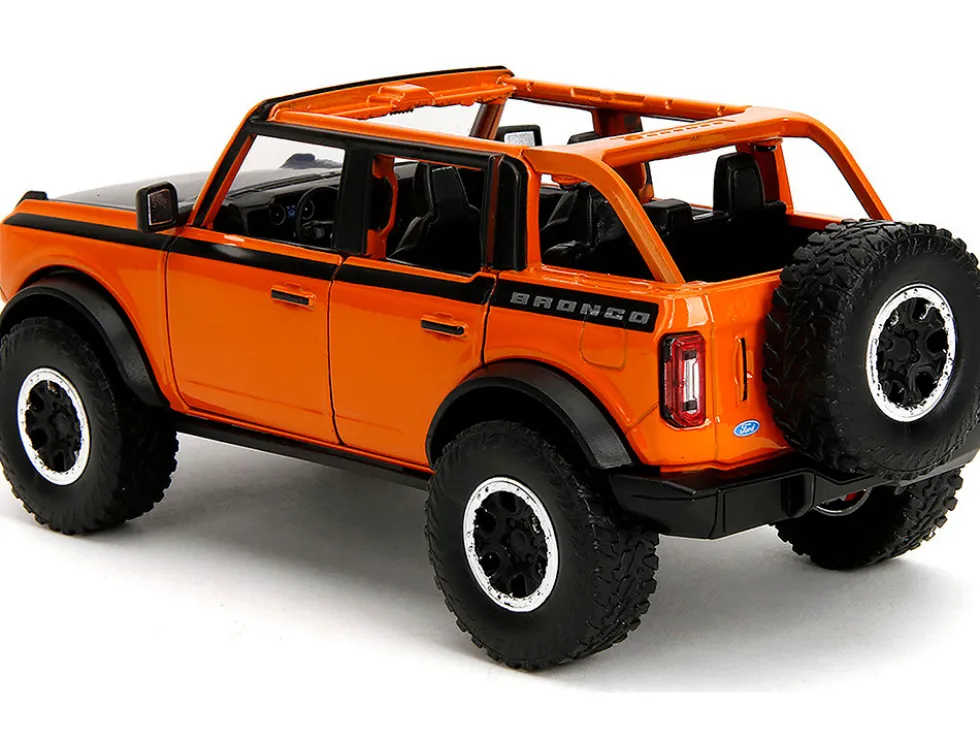 2021 Ford Bronco Open-Top Orange with Black Stripes and Hood with Extra Wheels "Just Trucks" Series 1/24 Diecast Model Car by Jada
