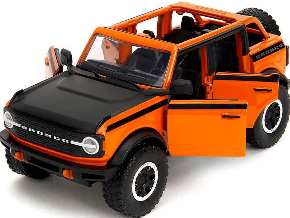 2021 Ford Bronco Open-Top Orange with Black Stripes and Hood with Extra Wheels "Just Trucks" Series 1/24 Diecast Model Car by Jada