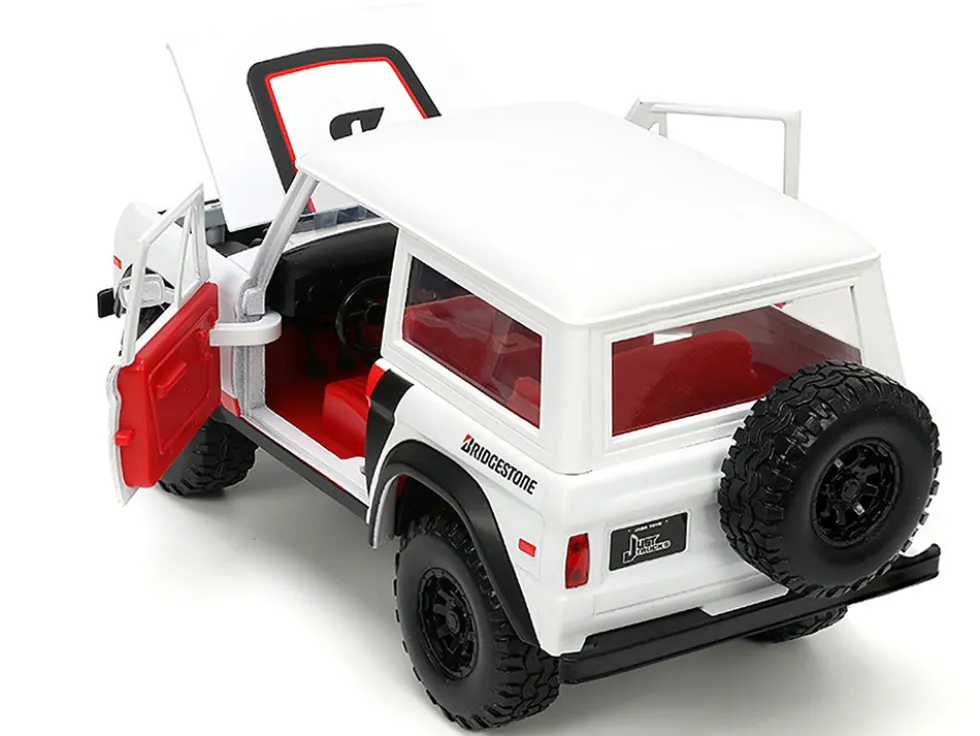 1973 Ford Bronco #008 White with Red and Black Stripes and Red Interior with Extra Wheels Just Trucks Series 1/24 Diecast Model Car Jada 34181