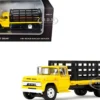 GMC 4000 Stake Truck Bright Yellow 1/64 Diecast Model by DCP/First Gear