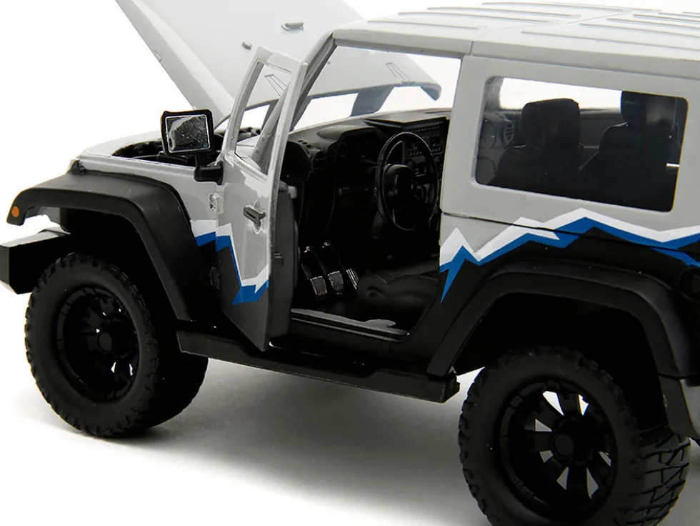 2007 Jeep Wrangler Gray and Black with Blue and White Stripes with Extra Wheels Just Trucks Series 1/24 Diecast Model Car Jada 34194