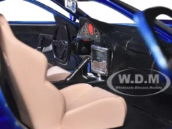 1993 Mazda RX-7 Candy Blue Metallic with Graphics and Chun-Li Diecast Figure Street Fighter Video Game Anime Hollywood Rides Series 1/24 Diecast Model Car Jada 30838