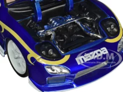 1993 Mazda RX-7 Candy Blue Metallic with Graphics and Chun-Li Diecast Figure Street Fighter Video Game Anime Hollywood Rides Series 1/24 Diecast Model Car Jada 30838