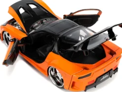 1995 Mazda RX-7 Widebody RHD Right Hand Drive Orange Metallic Black Han Diecast Figurine The Fast and the Furious Tokyo Drift 2006 Movie 1/24 Diecast Model Car Jada 33174