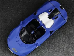 McLaren Elva Convertible #26 Matt Blue with White Stripes Extra Wheels 1/64 Diecast Model Car CM Models CM64-ELVA-01
