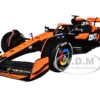 McLaren MCL38 #81 Oscar Piastri "OKX" Formula One F1 "Miami GP" (2024) with Driver Figure "Race" Series 1/24 Diecast Model Car by Bburago