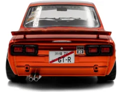 1970 Nissan Skyline (C10) Hakosuka RHD (Right Hand Drive) Orange Metallic 1/18 Diecast Model Car by Solido