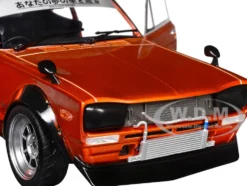1970 Nissan Skyline (C10) Hakosuka RHD (Right Hand Drive) Orange Metallic 1/18 Diecast Model Car by Solido