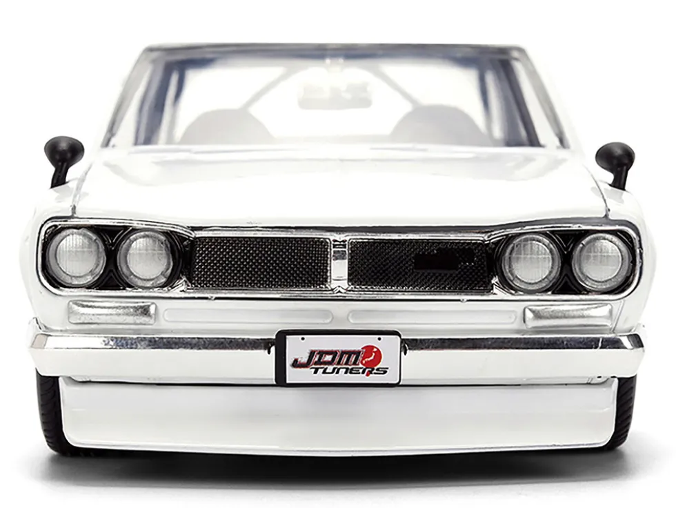 1971 Nissan Skyline 2000GT-R RHD (Right Hand Drive) White with Gold Graphics "JDM Tuners" Series 1/24 Diecast Model Car by Jada
