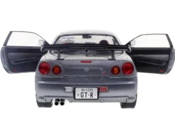 1999 Nissan Skyline GT-R (R34) RHD (Right Hand Drive) Silver Metallic with Purple Wheels 1/18 Diecast Model Car by Solido