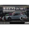Nissan Skyline GT-R (R34) "Top Secret" RHD (Right Hand Drive) Stealth Gray with Carbon Hood "GTSHOW 2025 Event Edition" 1/64 Diecast Model Car by Inno Models