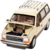1987 Plymouth Voyager Van Light Cream and Golden Bronze Metallic 2-Tone "Mighty Minivans" Series 1/64 Diecast Model Car by Auto World