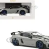 2023 Porsche Cayman GT4 RS Weissach Pack Chalk Gray with Carbon Hood Stripes 1/18 Diecast Model Car by Norev