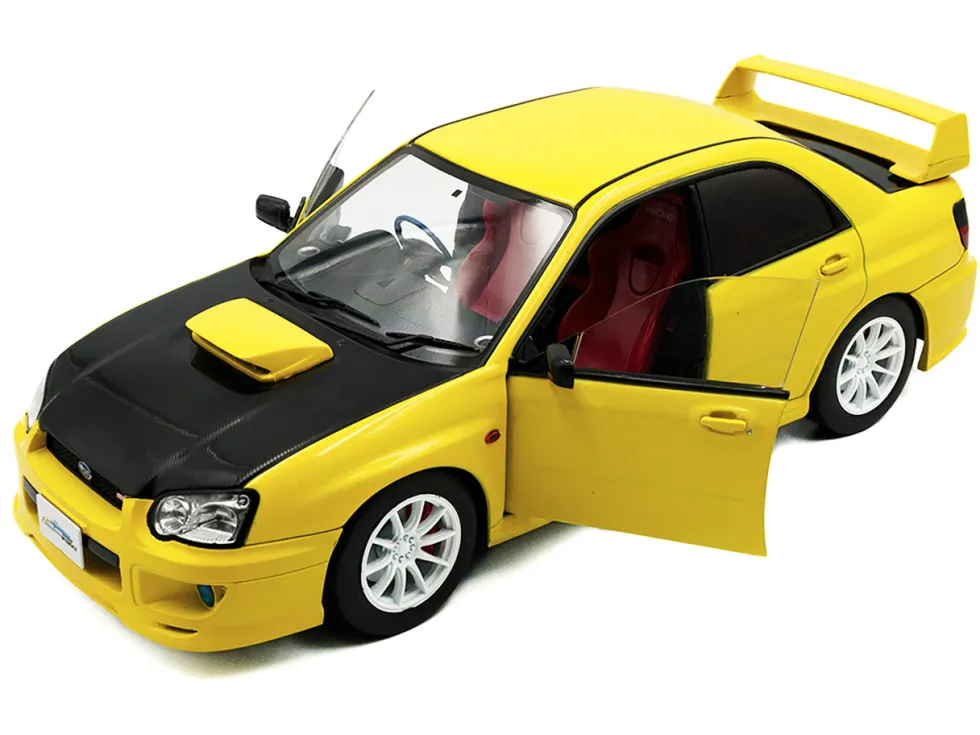 2003 Subaru Impreza WRX STI RHD (Right Hand Drive) Yellow with Carbon Hood 1/18 Diecast Model Car by Solido