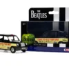 The Beatles London Taxi RHD (Right Hand Drive) "I Want To Hold Your Hand" Black and Cream with Graphics Diecast Model Car by Corgi