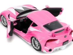 Toyota FT-1 Concept Pink Metallic and Pink Ranger Diecast Figurine Power Rangers Hollywood Rides Series 1/24 Diecast Model Car Jada 33224