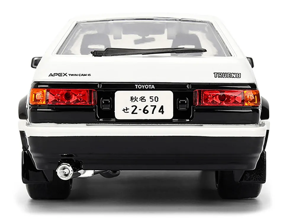 Toyota Trueno (AE86) RHD (Right Hand Drive) White and Black with Graphics and Takumi Diecast Figure "Initial D" (1998-2021) TV Series "Anime Hollywood Rides" Series 1/24 Diecast Model by Jada