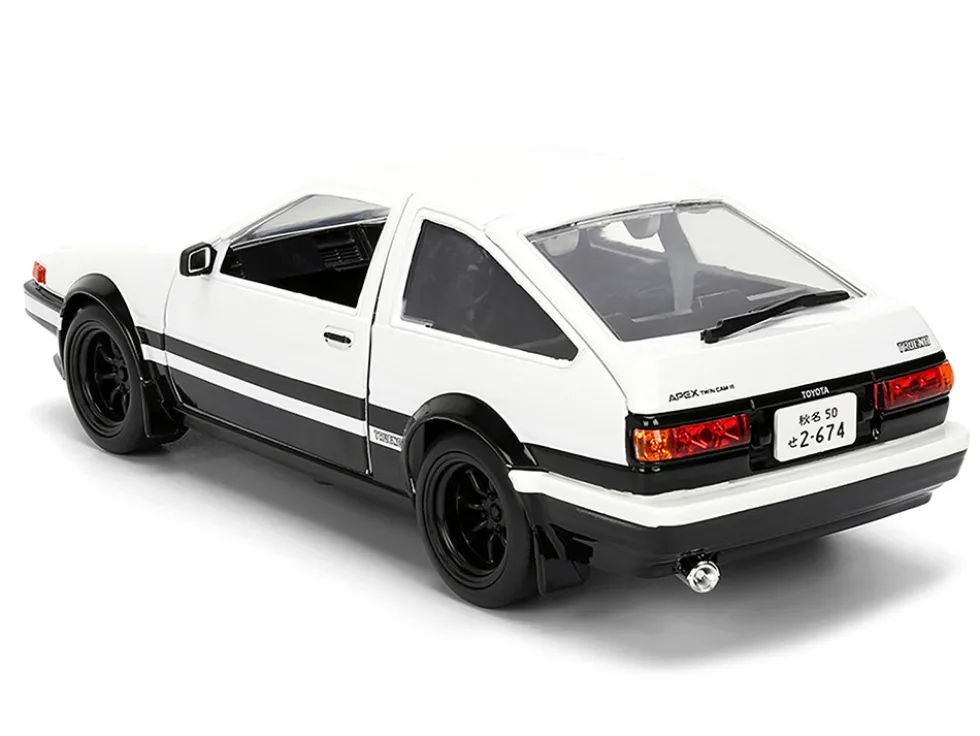 Toyota Trueno (AE86) RHD (Right Hand Drive) White and Black with Graphics and Takumi Diecast Figure "Initial D" (1998-2021) TV Series "Anime Hollywood Rides" Series 1/24 Diecast Model by Jada