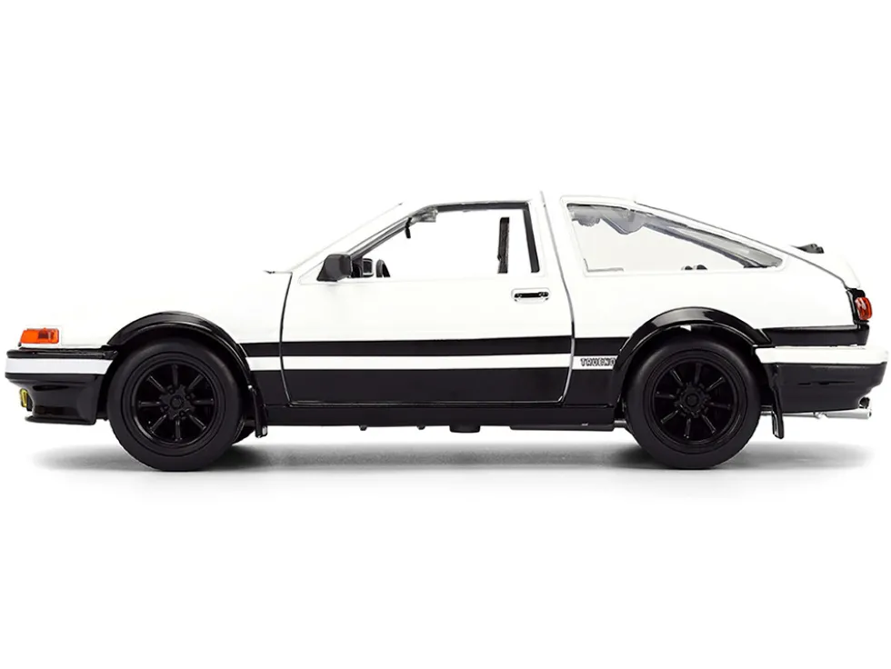 Toyota Trueno (AE86) RHD (Right Hand Drive) White and Black with Graphics and Takumi Diecast Figure "Initial D" (1998-2021) TV Series "Anime Hollywood Rides" Series 1/24 Diecast Model by Jada