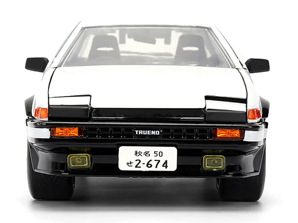 Toyota Trueno (AE86) RHD (Right Hand Drive) White and Black with Graphics and Takumi Diecast Figure "Initial D" (1998-2021) TV Series "Anime Hollywood Rides" Series 1/24 Diecast Model by Jada