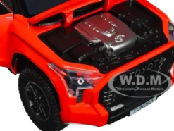 2023 Toyota Tundra TRD 4x4 Pickup Truck Solar Octane Orange with Sunroof and Wheel Rack 1/24 Diecast Model Car H08555R-SO